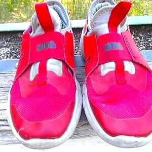 Red Nike running shoes size 2 Y